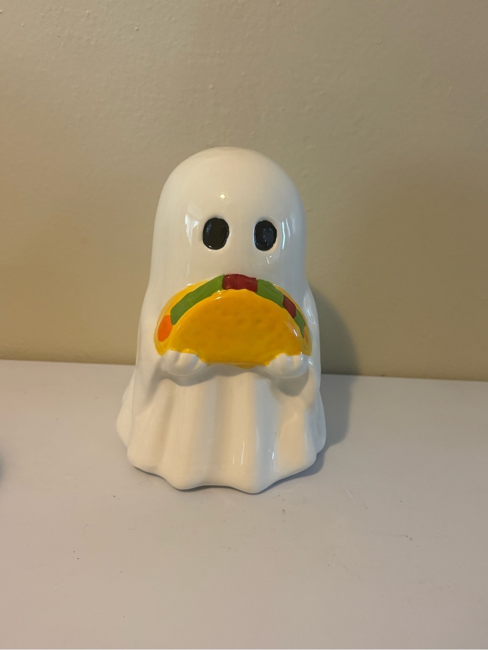 White Ceramic Ghost Figurine Holding Yellow Taco - Home Accent
